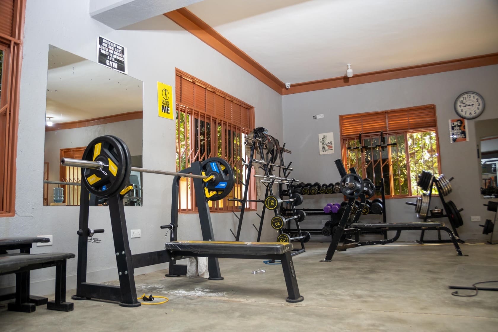State-of-the-art fitness center showing equipment and fitness coach.